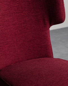 Aza is upholstered in soft furnishings, with a range of eclectic color combinations